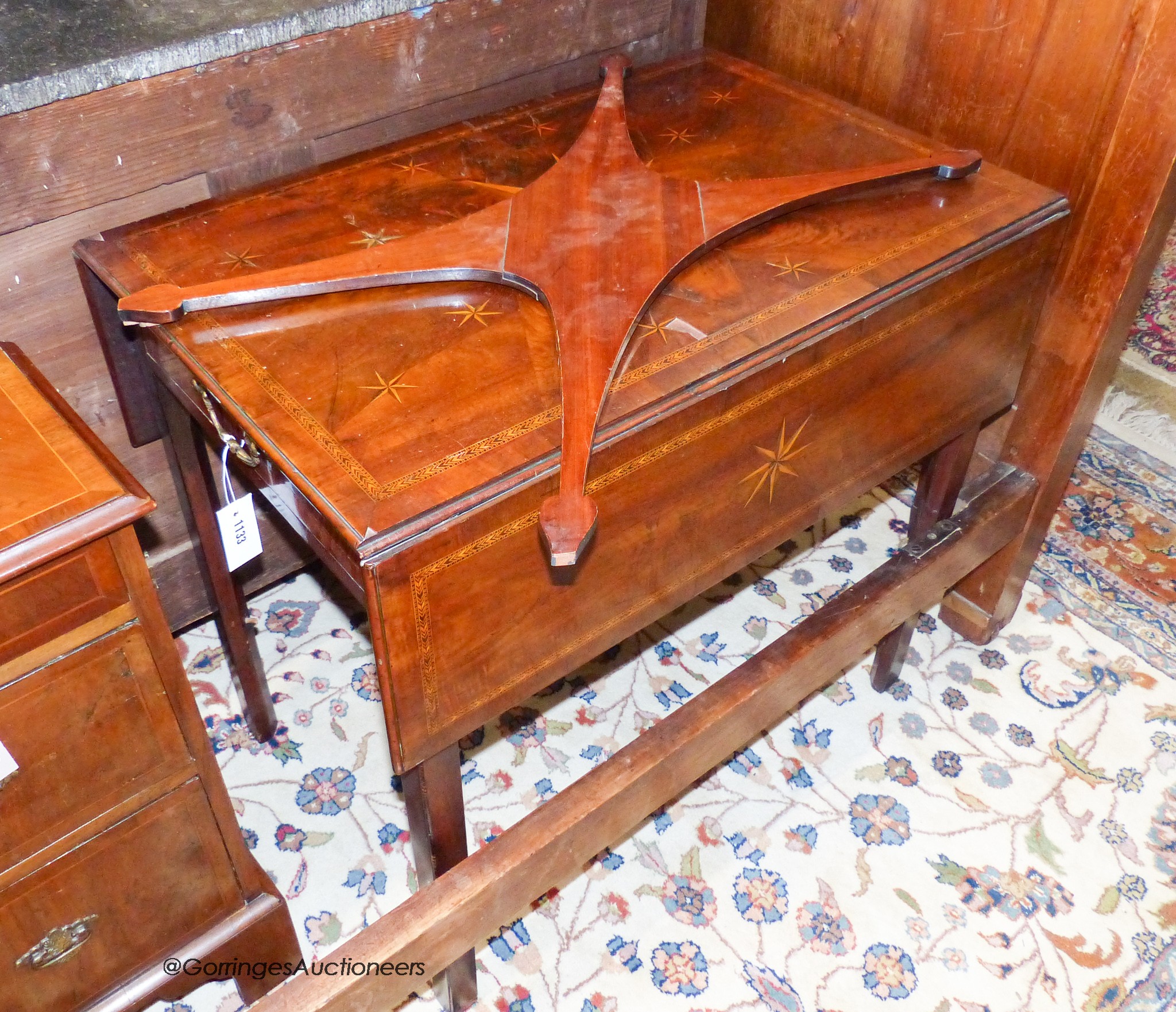A George III mahogany Pembroke table, inlaid with star motifs, width 78cm, depth 51cm, height 71cm
